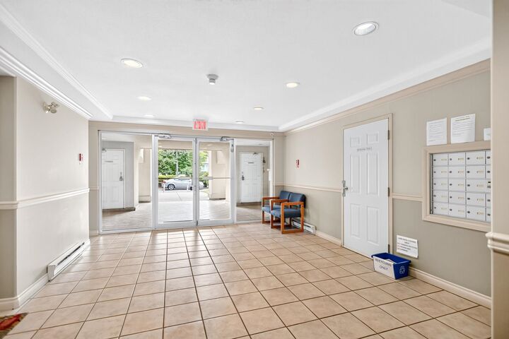 Property Photo:  33675 Marshall Road 206  BC V2S 1L4 