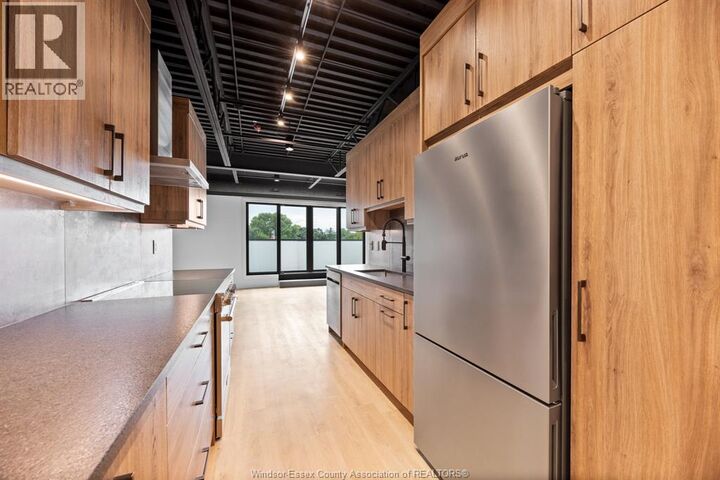 Property Photo:  3850 Dougall 209  ON N9G 1X2 