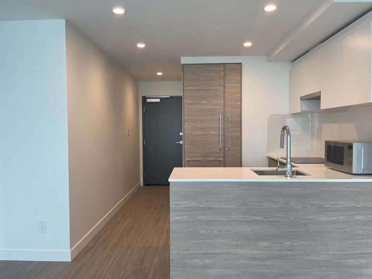 Property Photo:  13655 Fraser Hwy 13xx  BC V3T 0P8 