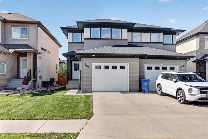 Property Photo: 128 Larry Vickar Drive MB R3W 0K4