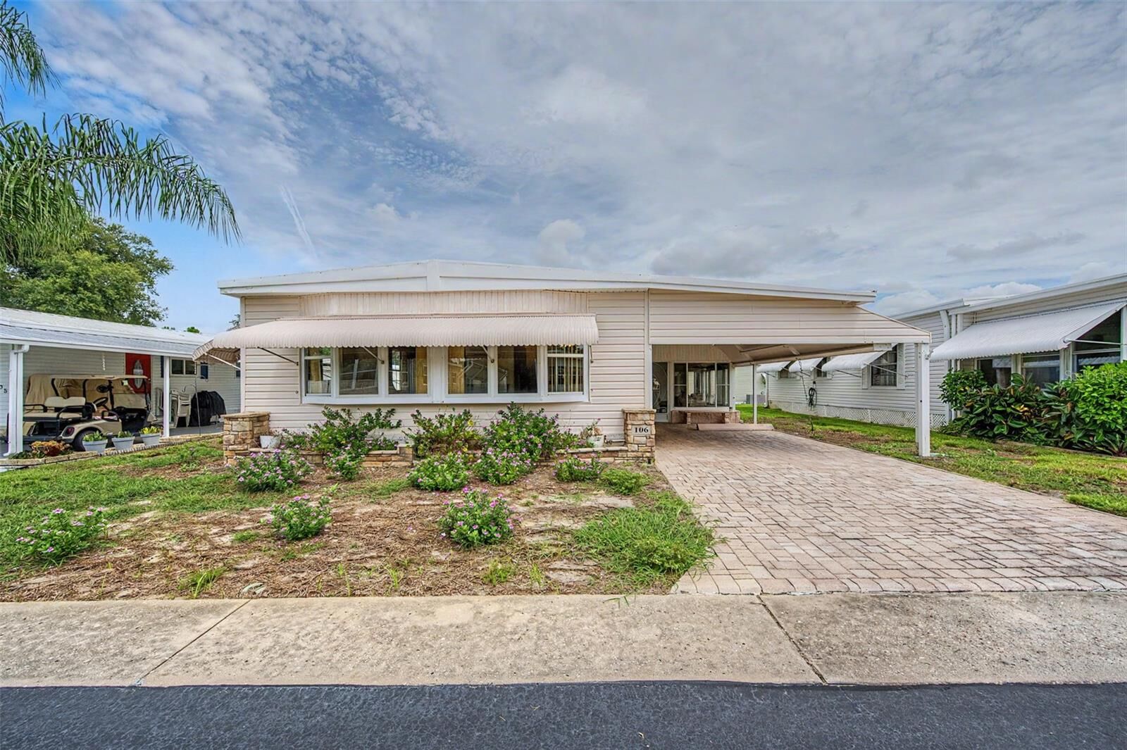 Property Photo:  39820 US Highway 19 N 106  FL 34689 