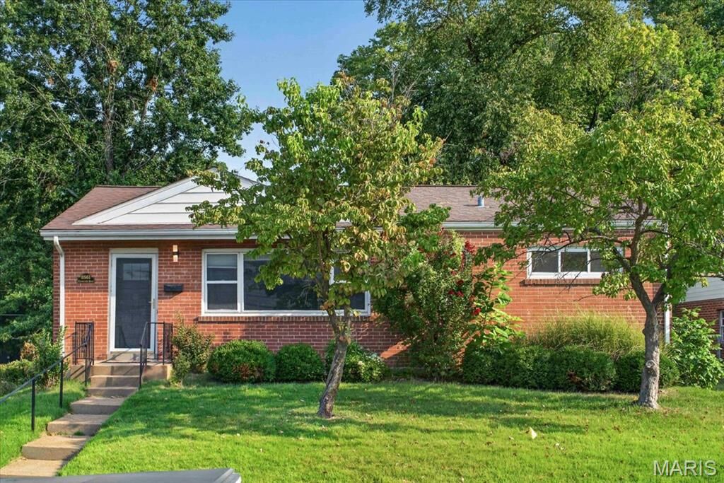 Property Photo:  8561 Everett Avenue  MO 63117 