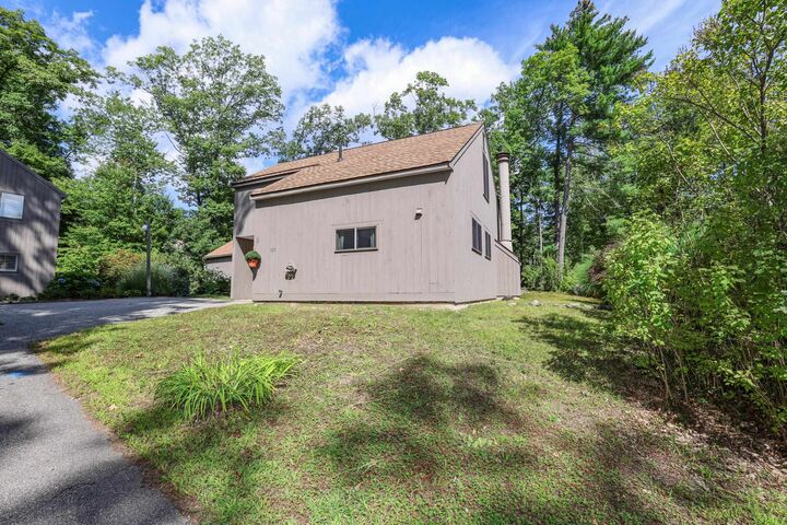 Property Photo: 105 Coburn Woods Drive NH 03063