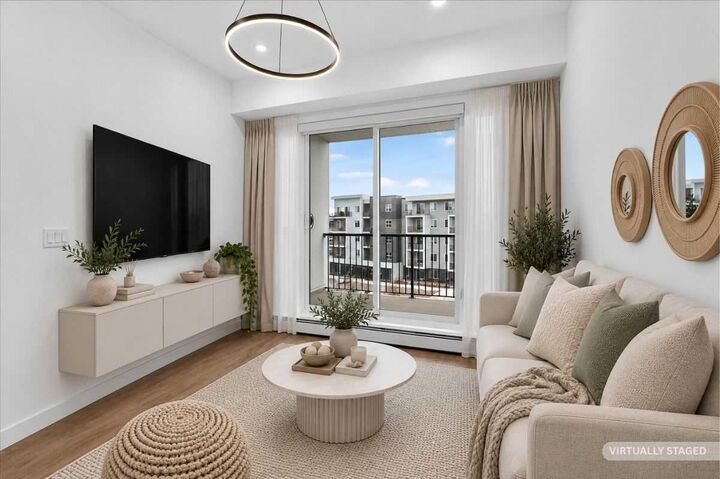Property Photo:  265 Wolf Willow Boulevard SE 2412  AB T2X 6R1 