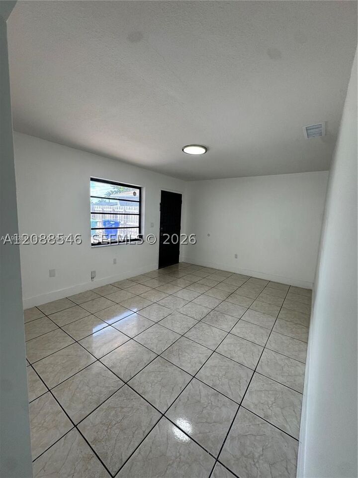 Property Photo:  1107 NW 30th Ave 1107  FL 33125 