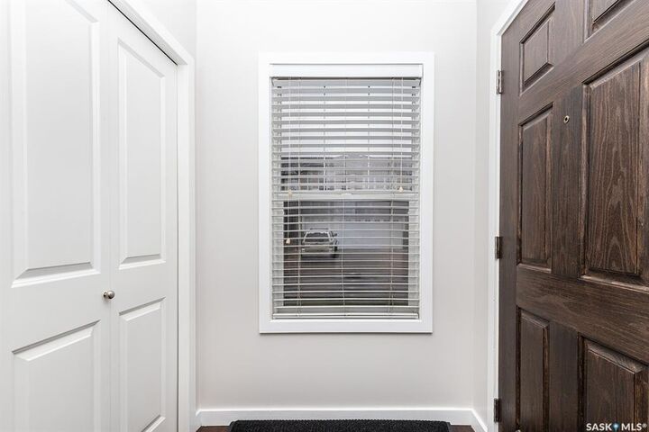 Property Photo:  410 Ledingham Way 211  SK S7V 0C4 