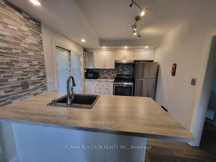 Property Photo:  256 Dunlop Street W  ON P0A 1C0 