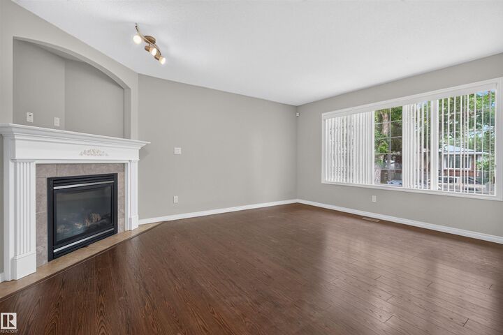 Property Photo:  11910 93 Street NW  AB T5G 1E5 