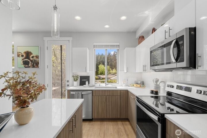 Property Photo:  7628  222nd Street SW A4  WA 98026 