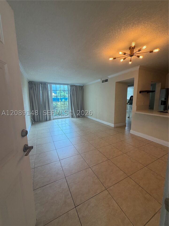 Property Photo: 300 Madeira Ave 102 FL 33134