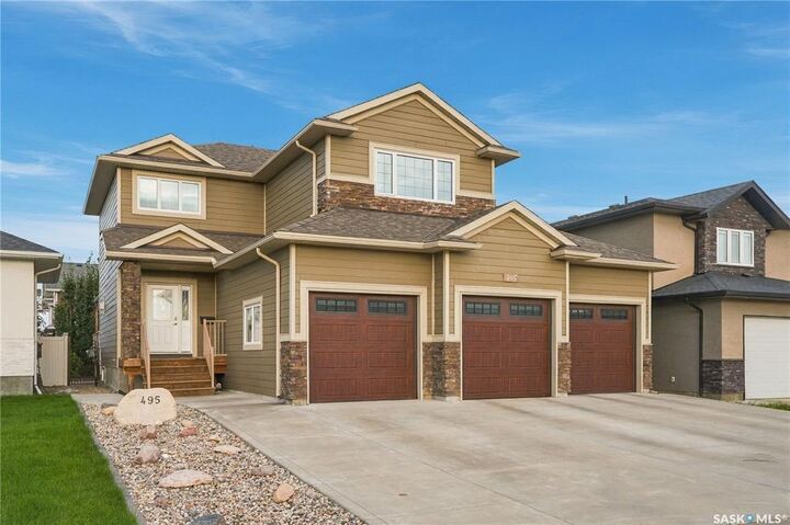 Property Photo:  495 Mahabir Crescent  SK S7W 0J7 