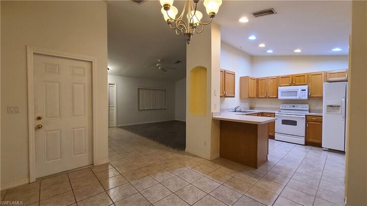 Property Photo:  3106 10th St W  FL 33971 