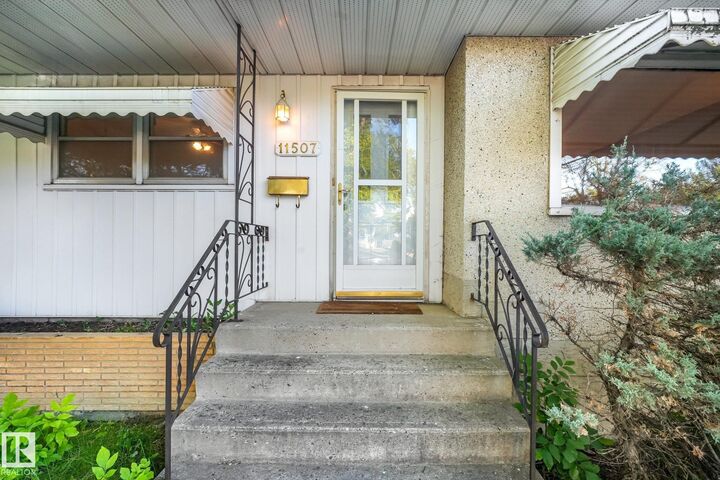 Property Photo: 11507 135 Street NW AB T5M 1K9