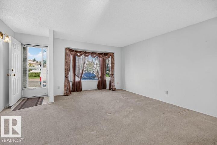 Property Photo: 7423 188 Street NW AB T5T 5J7