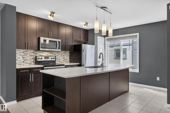Property Photo:  4850 Terwillegar Common NW 56  AB T6R 0T6 