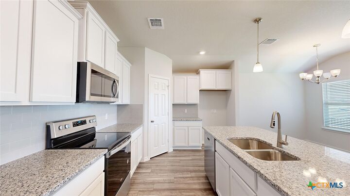 Property Photo: 1891 Caponier Street TX 76559