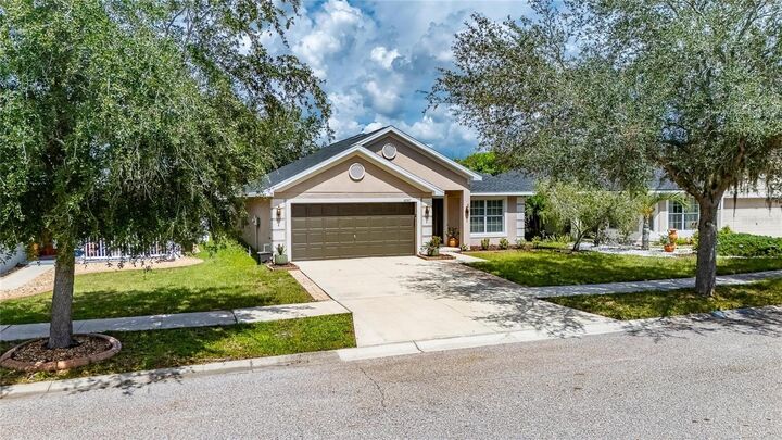 Property Photo: 10747 Standing Stone Drive FL 33598