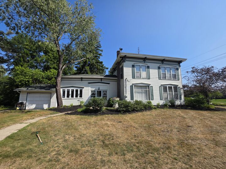Property Photo:  427 S Main Street NE  MI 49319 