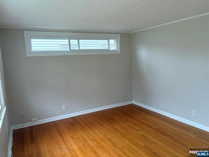 Property Photo:  148 E 54th 1  NJ 07410 