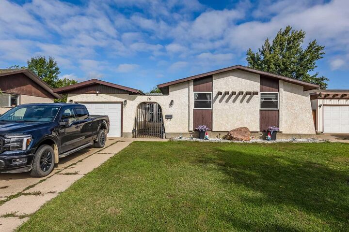 Property Photo: 76 Cypress Way SE AB T1B 1G8