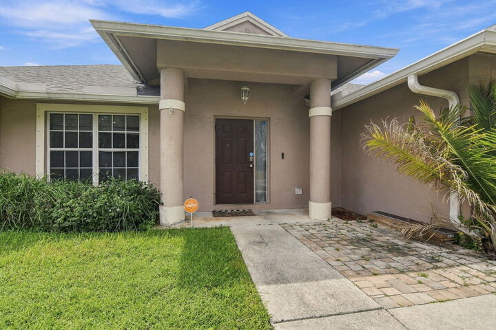 Property Photo: 1734 SW Capehart Avenue FL 34953