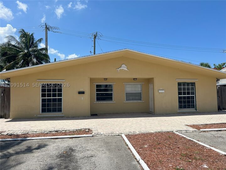 Property Photo: 311-315 NW 57th St FL 33309