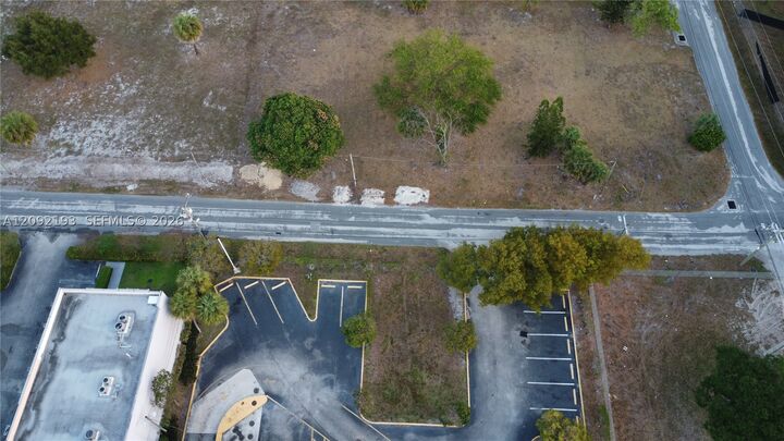 Property Photo:  NW 1st St  FL 33060 