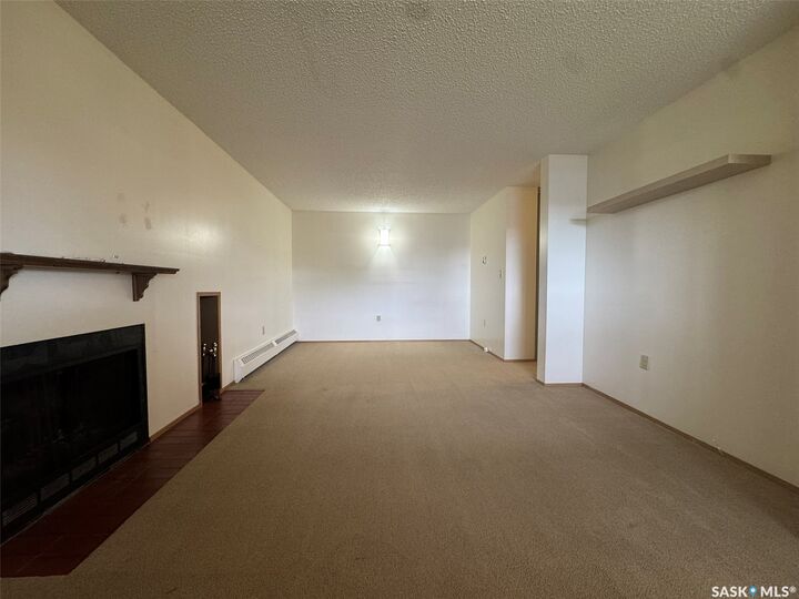 Property Photo:  67 Wood Lily Drive 415  SK S6J 1G6 