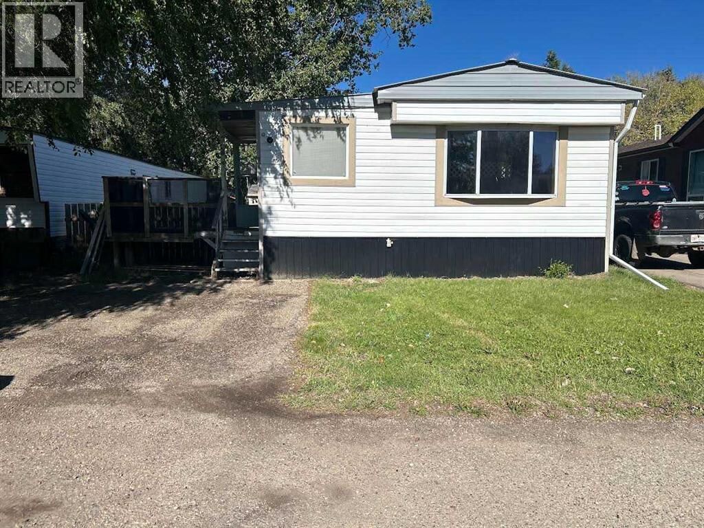 Property Photo: 77 Greenbrook Village AB T1R 0N1