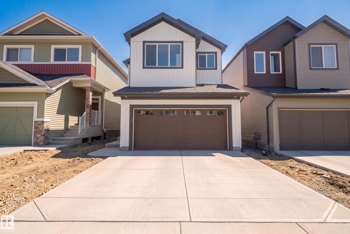 Property Photo:  20739 24 Avenue NW  AB T6M 2J7 