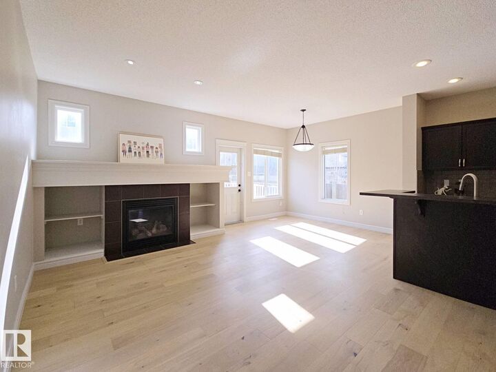 Property Photo: 11525 18A Avenue SW AB T6W 2E6
