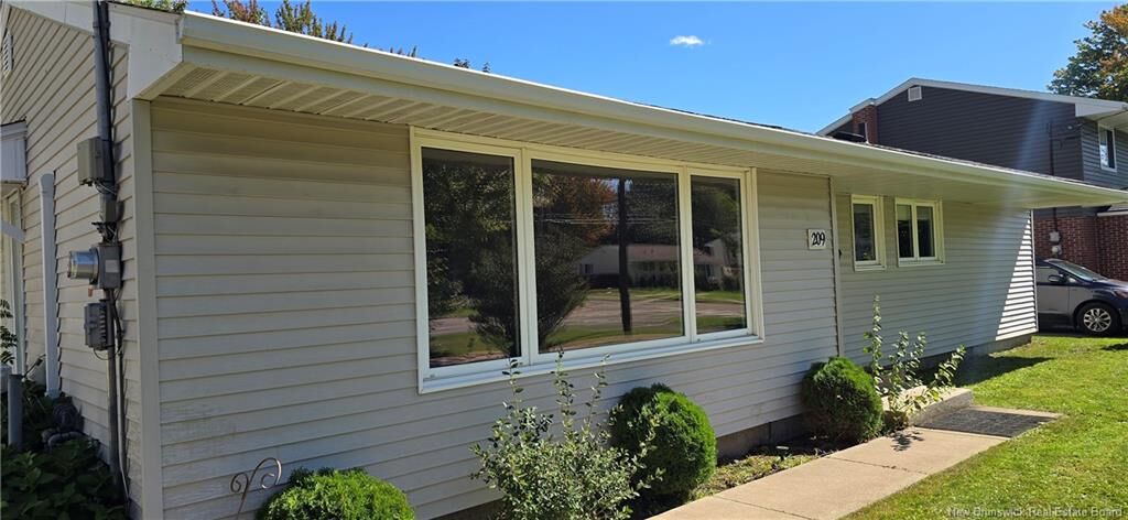 Property Photo:  209 Dickson Boulevard  NB E1E 2R2 