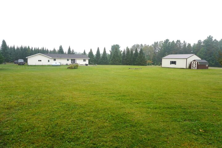 Property Photo:  W7380 Mathews Rd  WI 54452 