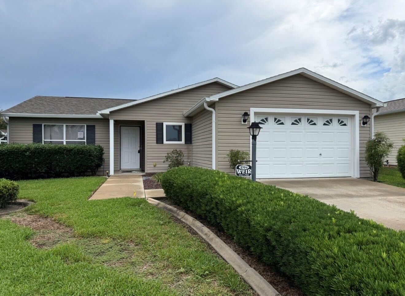 Property Photo:  2704 Benavides Drive  FL 32162 