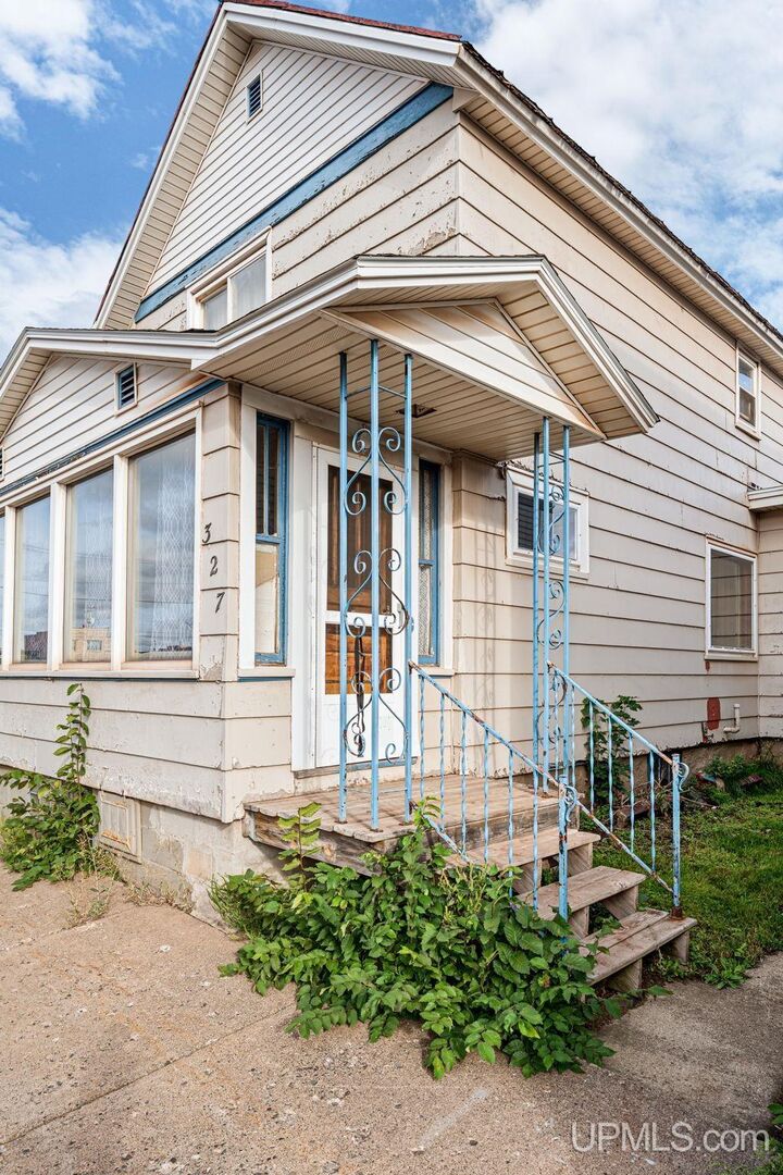 Property Photo:  327 Bank Street  MI 49849 