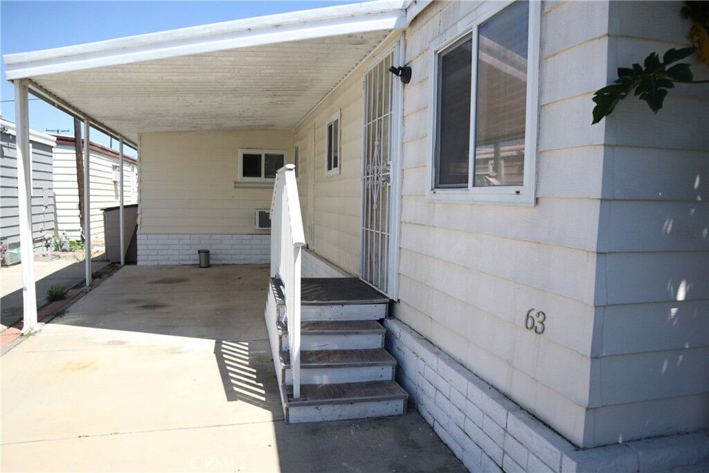 Property Photo:  15141 Beach Boulevard 63  CA 92655 
