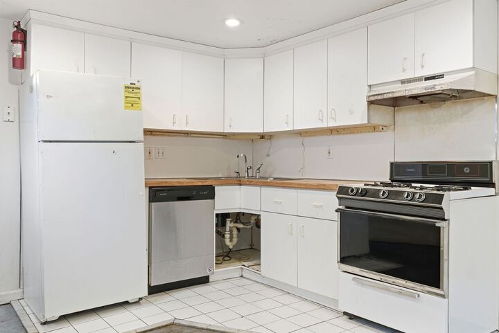 Property Photo: 29-31 Washburn Ave 1B MA 02140