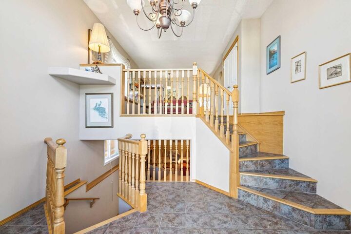 Property Photo: 223 Rocky Ridge Close NW AB T3G 4X2