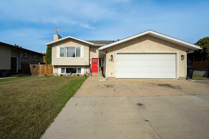 Property Photo:  307 Cochrane Crescent  AB T9K 1J2 