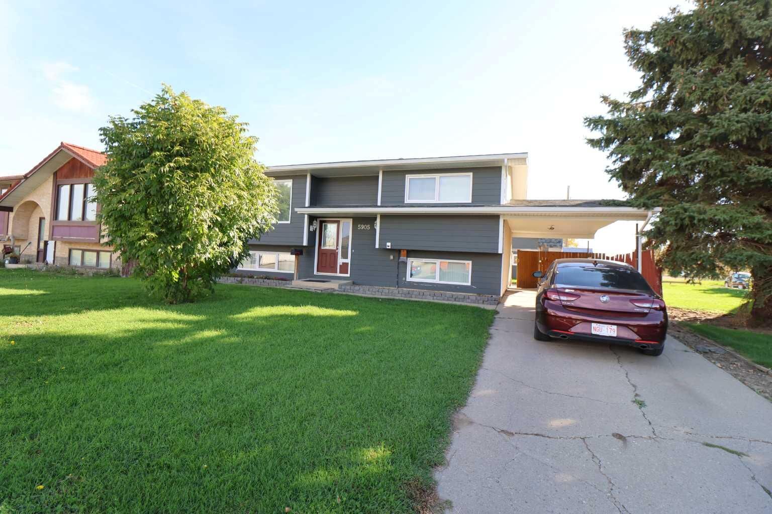 Property Photo:  5905 57 Street  AB T1G 1K1 
