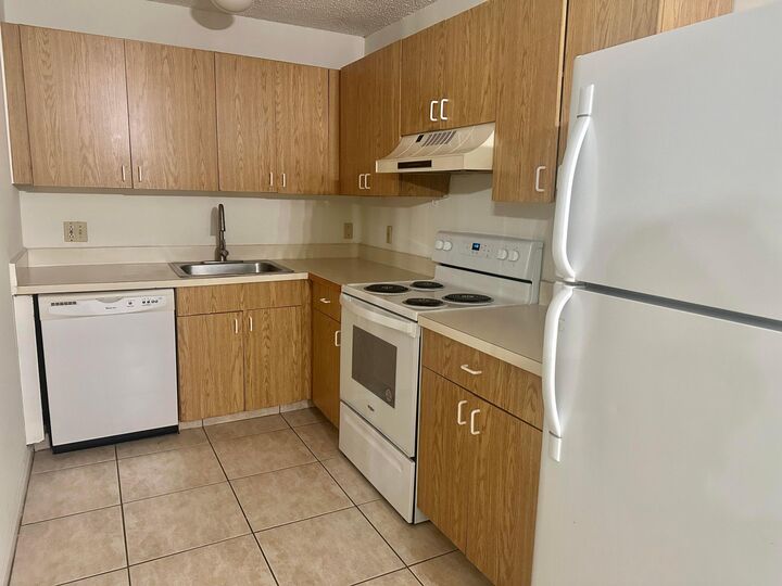 Property Photo:  5050 Sanctuary Way G  FL 33417 