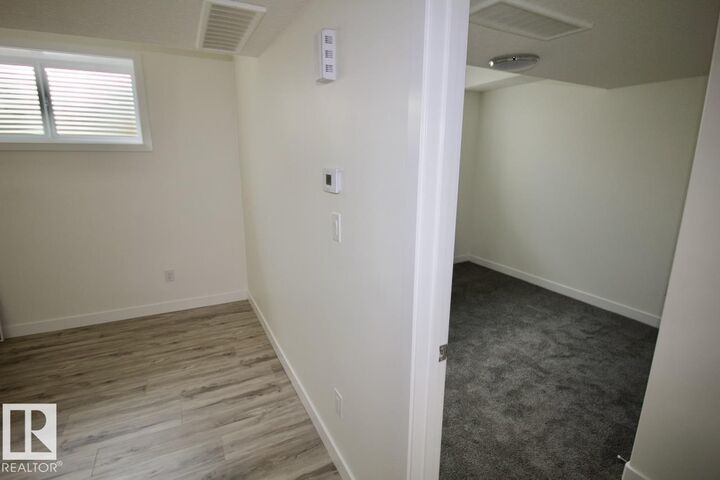 Property Photo:  8841 Carson Way SW Bsmt  AB T6W 5B8 