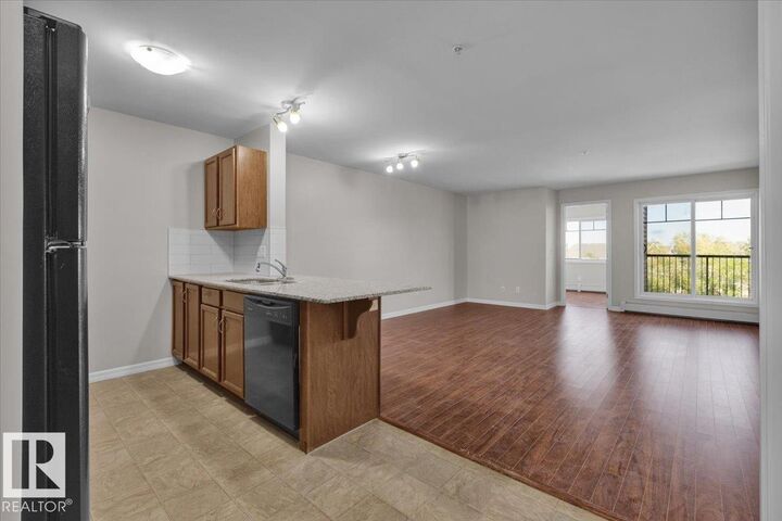 Property Photo:  271 Charlotte Way 319  AB T8H 0N9 