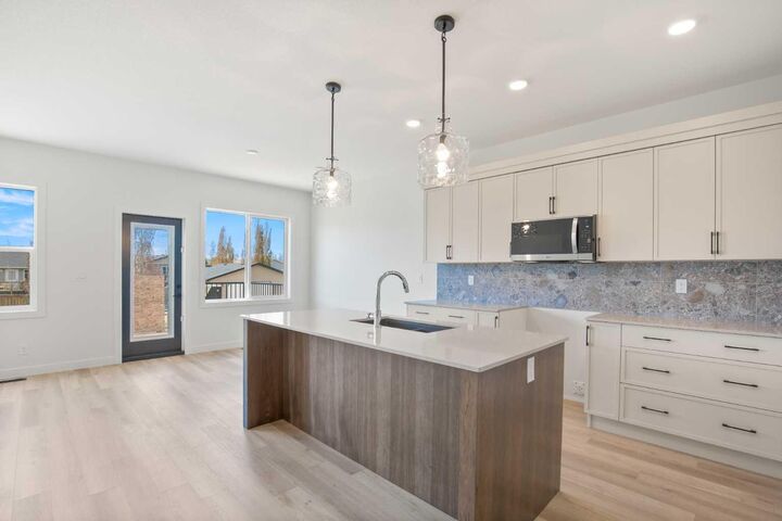 Property Photo:  32 Sunrise Crescent N  AB T0M 2A0 