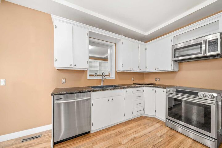 Property Photo:  227 4 Street SW  AB T1A 4E4 