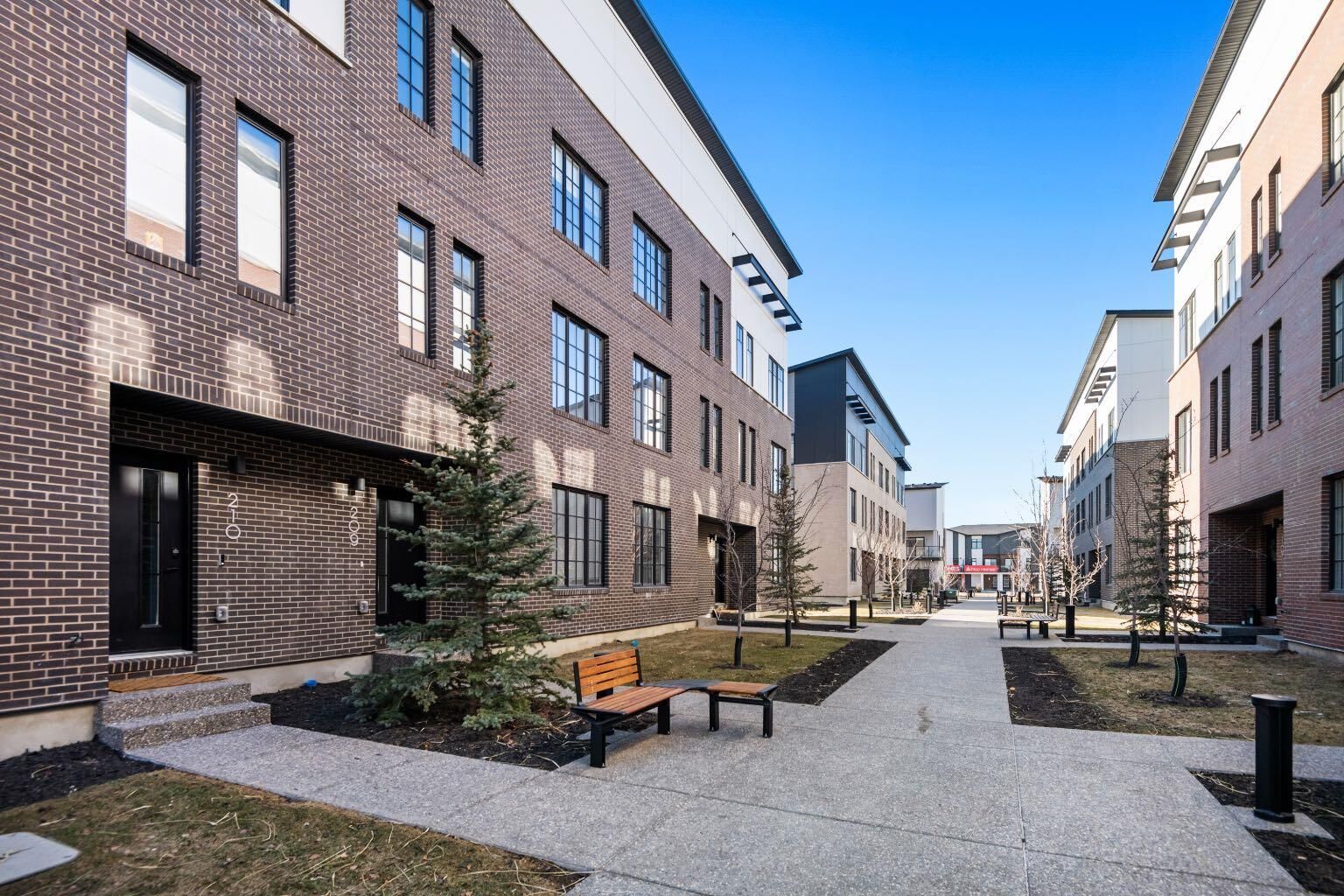 Property Photo:  8155 8 Avenue SW 203  AB T3H 6B1 