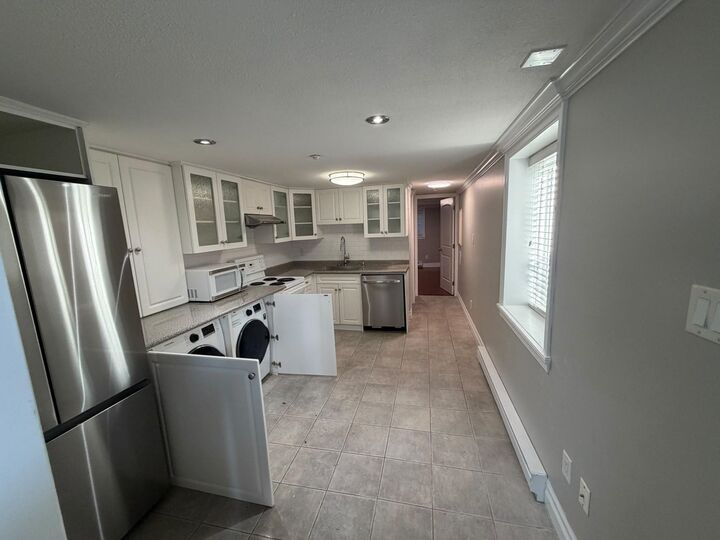 Property Photo:  4585 Commercial Street  BC V5N 4G8 