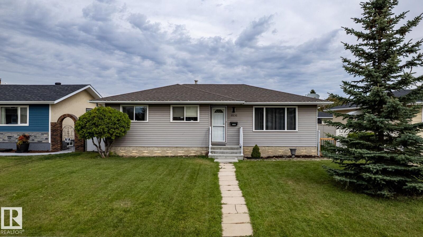 Property Photo:  8836 150 Avenue NW  AB T5E 2N5 