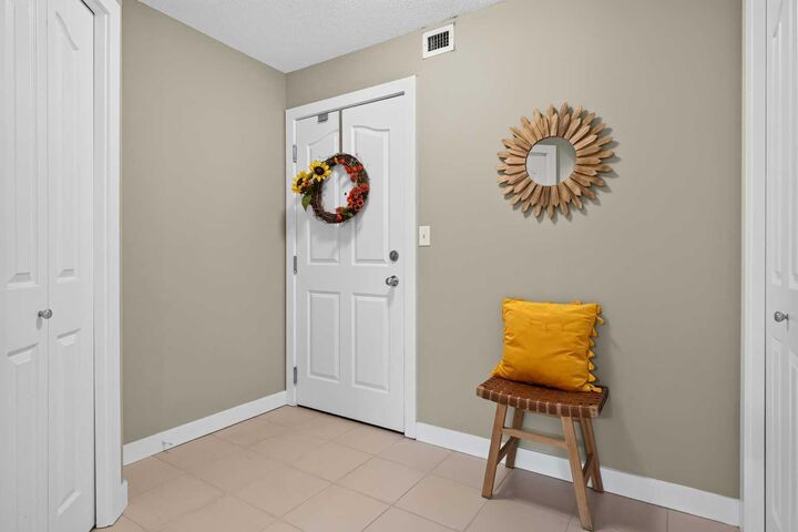 Property Photo: 403 Mackenzie Way SW 2206 AB T4B 3V7