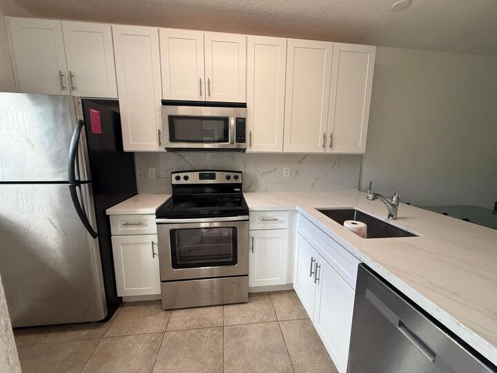 Property Photo:  3728 NW 91st Lane 3728  FL 33351 
